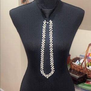 Elegant Black Tie with Pearl Accents